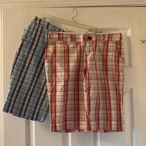 Juniors knee shorts, low rise.  In reddish orange color and a blue color.